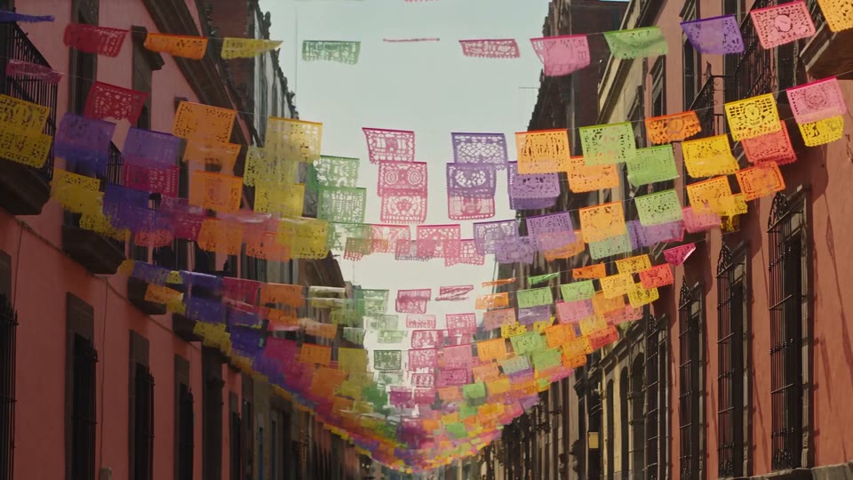 A release film moving through a colourful city and evening rooftops
